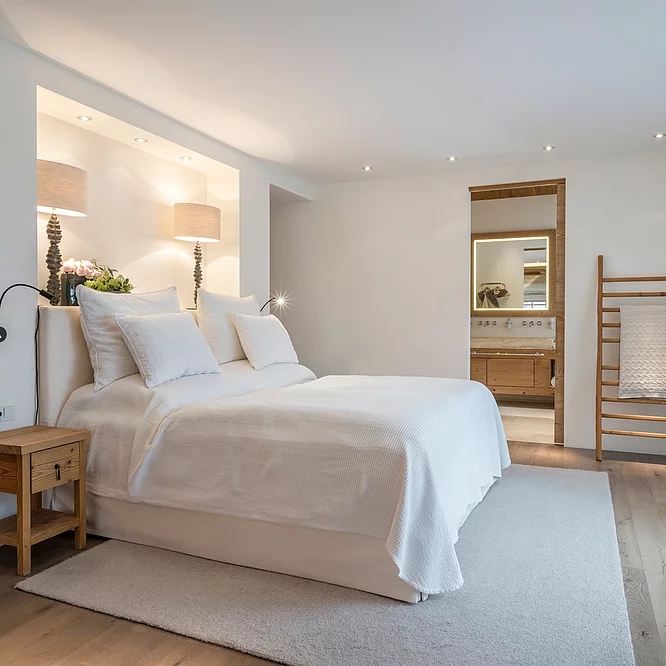 400 m2 alpiner Luxus Ein gemütliches Schlafzimmer in der Schmiedalm - dem Chalet in Saalbach Hinterglemm
